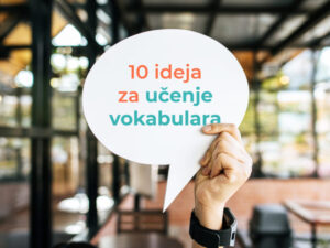 a hand holding a sign saying "10 ideja za učenje vokabulara"